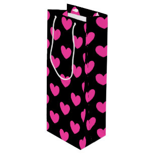 Fuchsia pink polka hearts on black wine gift bag