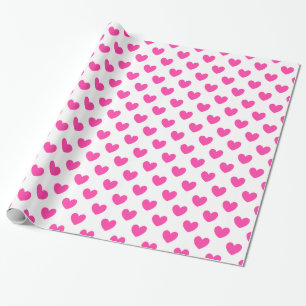 Fuchsia pink polka hearts on white wrapping paper