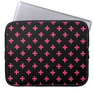 Fuchsia polka crosses on black laptop sleeve