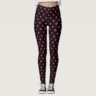 Fuchsia polka crosses on black leggings