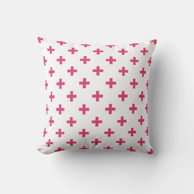 Fuchsia polka crosses on white cushion (Front)