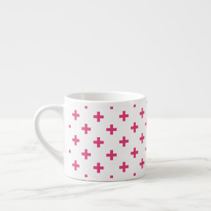 Fuchsia polka crosses on white espresso cup