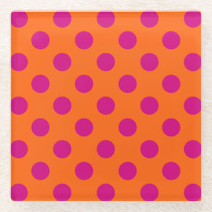 Fuchsia polka dots on orange glass coaster