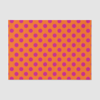 Fuchsia polka dots on orange tissue paper