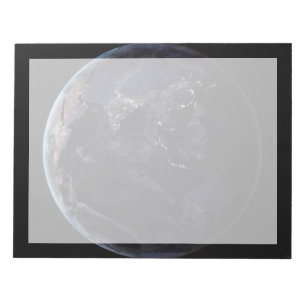 Full Earth Showing City Lights Of Asia At Night. Notepad