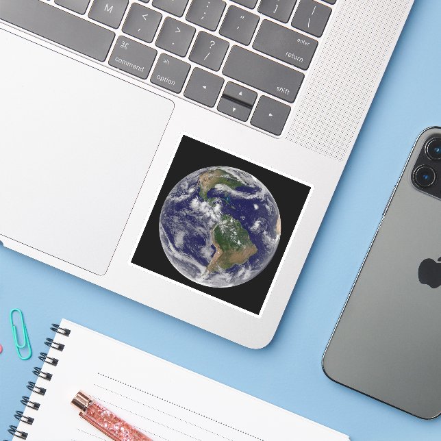 Full Earth Showing Various Tropical Storm Systems. (Laptop w/ iPhone)