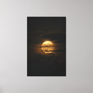 Full Moon Glow Behind Dark Clouds Canvas Print