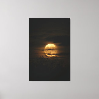 Full Moon Glow Behind Dark Clouds Canvas Print