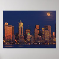 Full moon rising over downtown Seattle skyline