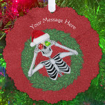 Fun Christmas Skeleton Holding Ornaments in Wreath<br><div class="desc">This hanging ornament card has a fun skeleton holding to shiny Christmas ornament balls up to his eyes inside a pine wreath wearing a Santa hat on a festive red background.  Customise your text with the templates on the front and back.</div>