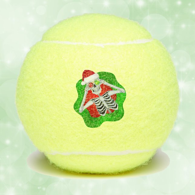 Fun Christmas Skeleton Ornaments Santa Hat Green Tennis Balls (Fun Christmas skeleton ornament eyes Santa Hat in green red splatter shape on tennis balls.)