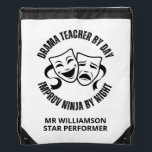 Fun DRAMA TEACHER By Day IMPROV NINJA By Night  Drawstring Bag<br><div class="desc">Stylish IMPROV Drawstring Bag with CUSTOMIZABLE TEXT and wording that reads DRAMA TEACHER BY DAY IMPROV NINJA BY NIGHT, which should appeal to those in the teacher niche. Ideal accessory gift for people who also love improvisational theatre or stand-up comedians. Also great for TEACHER APPRECIATION for your drama teacher. The...</div>