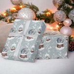 Fun merry Christmas illustration photo snowglobe Wrapping Paper<br><div class="desc">Cute fun merry Christmas illustration, add one photo and turn it into a cute winter snowglobe with snowflakes,  mountain,  snowman,  pine branches,  add your name and season's greetings! On editable ice blue.</div>