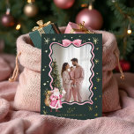 Fun Retro Santa Wavy Pink Ribbon Photo Christmas<br><div class="desc">Embrace the festive spirit with our fun retro vintage wavy Christmas pink ribbon photo Christmas foil card. This delightful card showcases our handpainted charming retro-style watercolor illustrations, including Santa, reindeer, and a Christmas tree, all adorned with playful pink accents. The photo is framed by a beautiful pink retro bow border,...</div>