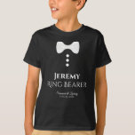 Fun Ring Bearer White Bow Tie Black Wedding T-Shirt<br><div class="desc">These fun t-shirts are designed as favours or gifts for wedding ring bearers. The t-shirt is black and features an image of a white bow tie and three buttons. The text reads Ring Bearer, and has a place to enter his name as well as the wedding couple's name and wedding...</div>