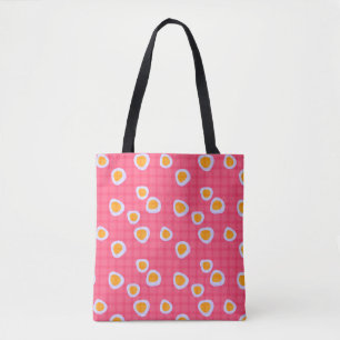 Fun spots on a coral pink chequered background tote bag