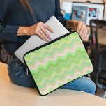Fun Summer Orange Lime Green Ikat Zigzag Pattern Laptop Sleeve<br><div class="desc">Beautiful contemporary bright lime green, orange, yellow and white zig zag tribal pattern. Ornate, funky, modern and whimsical hipster design for the artistic or artsy hip trend setter, vintage retro, nouveau deco art style or abstract graphic digital geometric motif lover. Unique, fashionable, trendy and cool design available on a wide...</div>