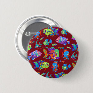Fun tropical fishes on dark red 6 cm round badge