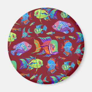 Fun tropical fishes on dark red magnet