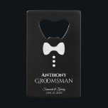 Fun White Tie Tuxedo Groomsman Wedding<br><div class="desc">This fun bottle opener is designed as a gift for Groomsmen. Features a fun design with a white tie and three buttons on a black background resembling a tuxedo. The text reads "Groomsman" with a place for his name, the wedding couple's names and wedding date. Great thank you gift or...</div>