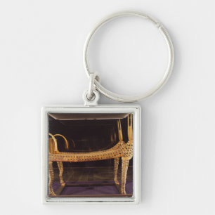 Funerary bed in the form of the sacred cow key ring