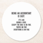 Funny Accountants - Being Accountant is Easy Round Paper Coaster<br><div class="desc">This funny and sarcastic design is perfect for sassy accountants. It features the statement " Being Accountant is easy. It's like riding a bike. Except the bike is on fire. You're on fire. Everything is on fire." It is perfect for CPAs (Certified Public Accountants),  bookkeepers,  and accounting officers.</div>