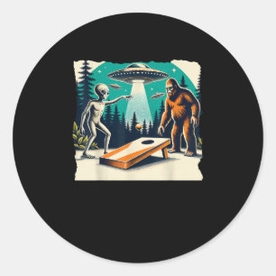 Funny Alien Playing cornhole Bigfoot And UFO Classic Round Sticker