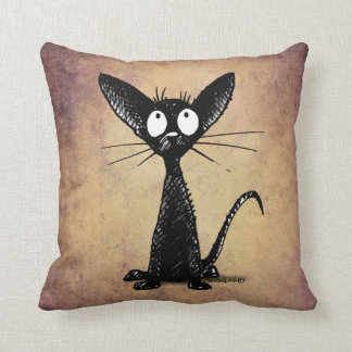 Funny Black Oriental Shorthair Cat on Vintage Tan Cushion