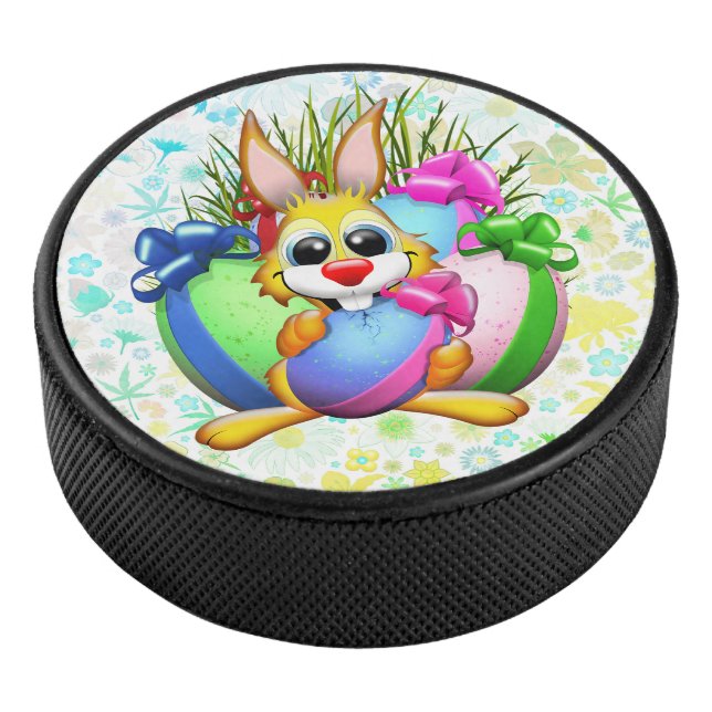 Funny Bunny biting an Easter Egg Hockey Puck (3/4)