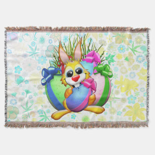 Funny Bunny biting an Easter Egg Throw Blanket