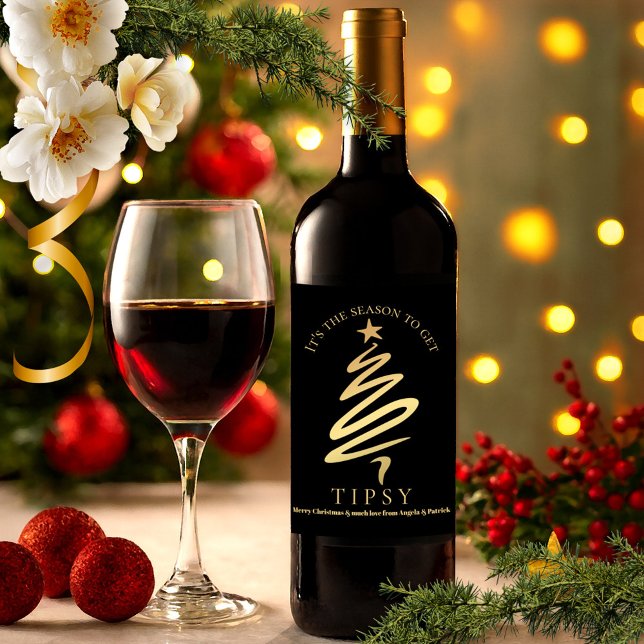 Funny Chic Black and Gold Christmas Wine Label (Holiday wine label featuring a gold stylized Christmas tree on a black background)