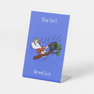 Funny cockatoo playing rock guitar cartoon pedestal sign