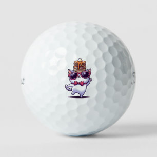 Funny cute cat balancing pancake stack golf balls