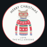 Funny Cute Cat Wearing Ugly Christmas Sweater Classic Round Sticker<br><div class="desc">Funny winter holiday Christmas sticker featuring a cat wearing red glasses and an "Ugly" Christmas Nordic Sweater. Actually, we think he's rather cute! Add your custom text above or leave Merry Christmas . . . add your name below. Makes the perfect Christmas sticker for gifts and cards for cat lovers....</div>