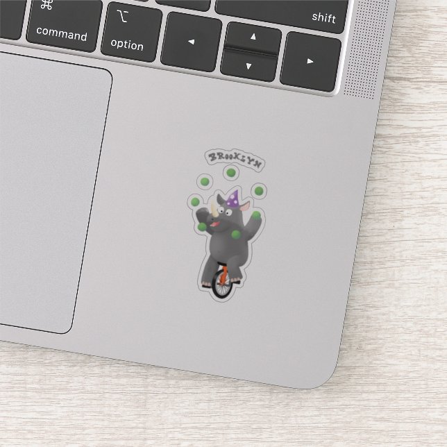 Funny cute rhino juggling on unicycle (Detail)