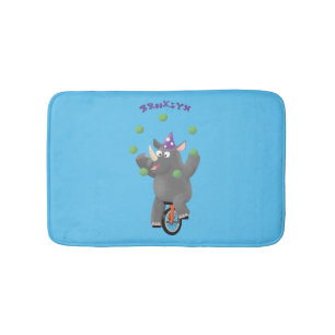 Funny cute rhino juggling on unicycle bath mat