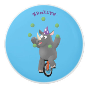 Funny cute rhino juggling on unicycle ceramic knob