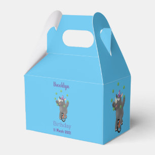 Funny cute rhino juggling on unicycle favour box