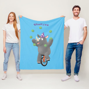 Funny cute rhino juggling on unicycle fleece blanket