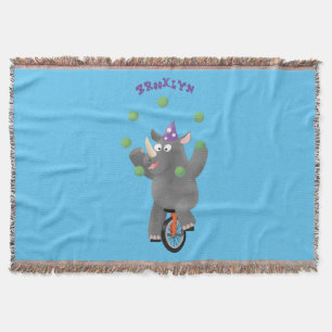 Funny cute rhino juggling on unicycle throw blanket