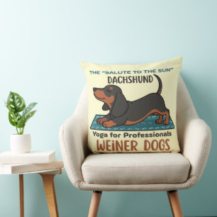 Funny dachshund doing the sun salutation (yoga) cushion