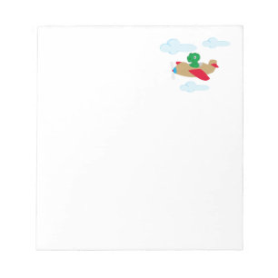 Funny dino flying by plane notepad