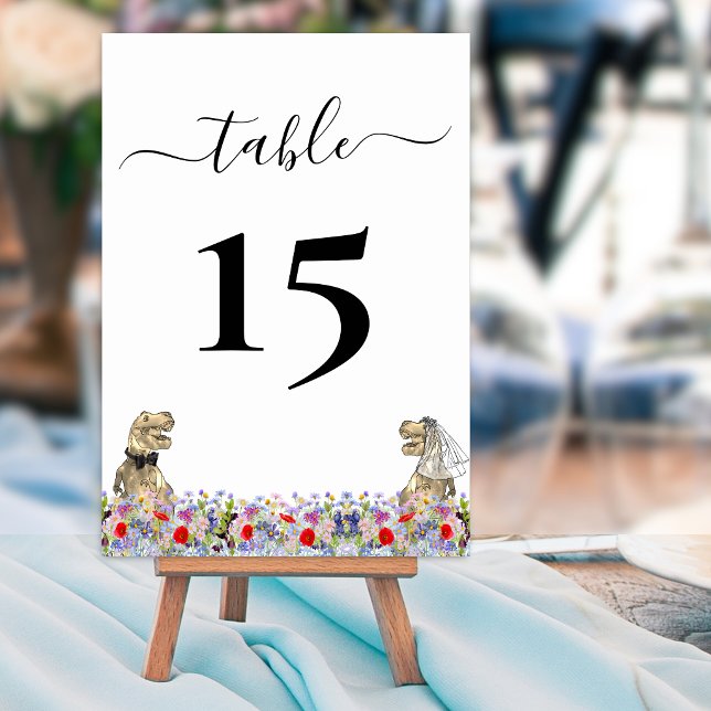 Funny Dinosaur Bride & Groom Wedding Table Number (Funny boho Dinosaur bride and groom custom wedding table numbers colorful wildflower meadow florals)