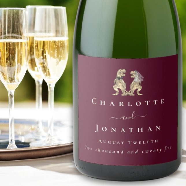 Funny Dinosaur Wedding Burgundy & Cream Custom Sparkling Wine Label (Dinosaur wedding funny T-Rex bride & groom elegant Modern script custom burgundy & cream wine labels)