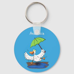Funny duck with umbrella dancing cartoon key ring