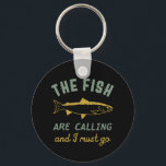 Funny Fishing Quote The Fish Are Calling I Must Go Key Ring<br><div class="desc">Funny and humourous design for fisherman, angler, those who love river and lake fishing. This vintage, retro and distressed merchandise is great to wear on your fishing trip to the cabin by the wood. Bring your gears, fishing rod, fishing reel and let's catch some fish. Great Christmas gift and birthday...</div>