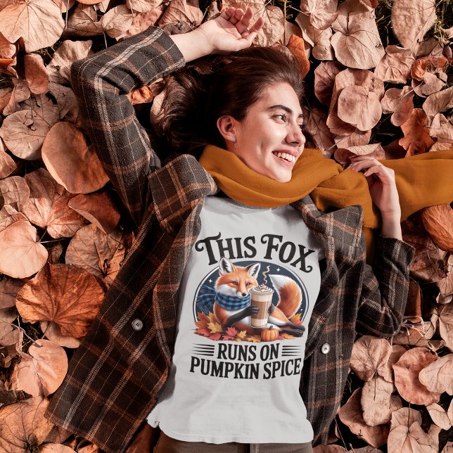 Funny Fox Pumpkin Spice Fall Coffee Humour Tri-Blend Shirt (young lady wearing funny pumpkin spice fall tshirt and playing in a pile of autumn leaves)