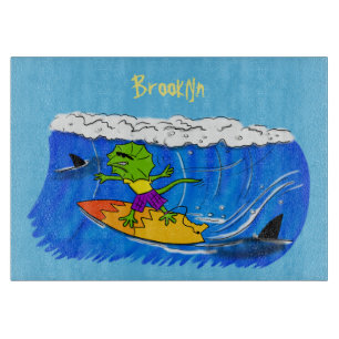 Funny frilled neck lizard surfing cartoon cutting board