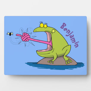 Funny frog and fly cartoon plaque