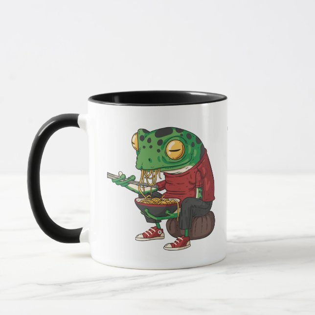 Funny frog art illustration of frog eating ramen mug (Left)